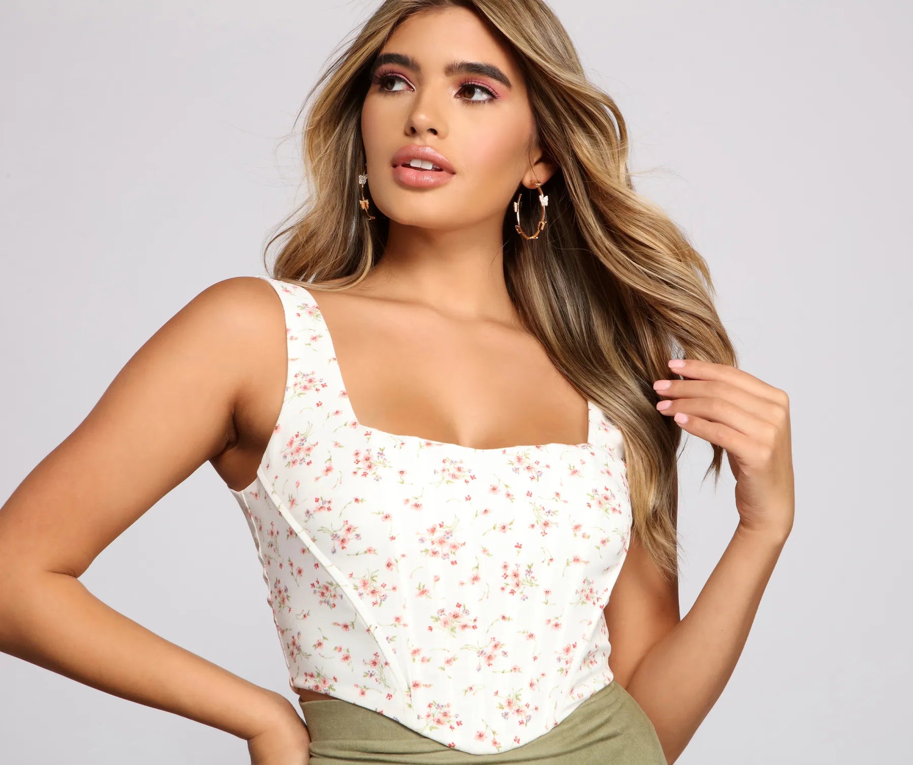 women's tops for those who want to stay on top of the latest fashion trends and wear pieces that are both stylish and on-trendFloral Fusion Corset Crop Top